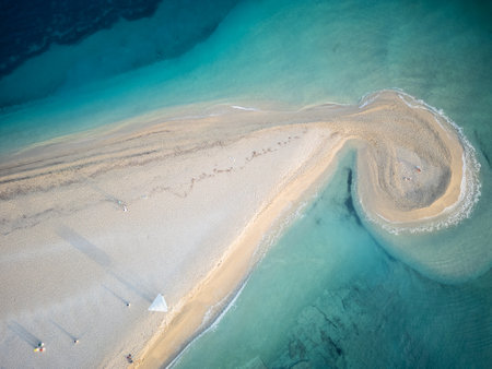 Aerial view of sandy beach with turquoise water and white sandの写真素材