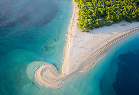 Aerial view of beautiful tropical island with white sand beach and turquoise seaの写真素材