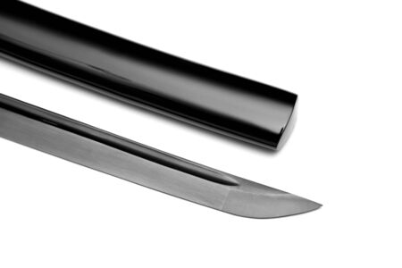 Close up Black blade Japanese sword with glossy black  scabbard on white backgroundの写真素材
