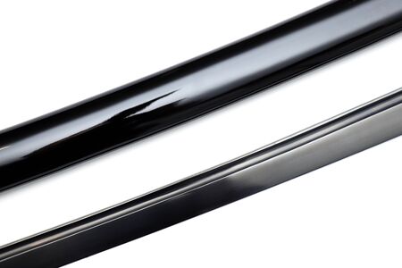 Close up Black blade Japanese sword with glossy black  scabbard on white backgroundの写真素材