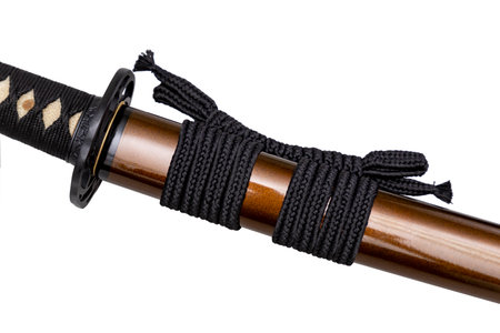Black color Sageo - Japanese sword sheath rope made of high quality silk isolated on white background. Selective focus.の写真素材