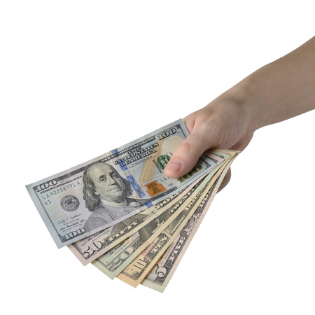 Hand holding of Dollar Bills. Isolated on white background.の写真素材