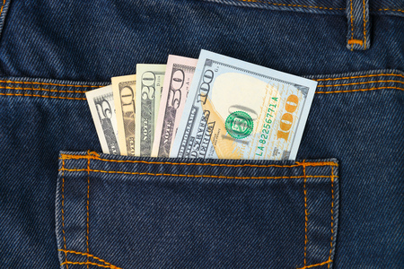 Dollar Bills in the pocket of jeansの写真素材