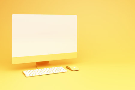 yellow desktop with keyboard and mouse 3d renderingの写真素材