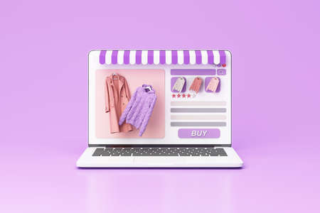Online store concept on laptop screen with striped awning and coat and sweater dress pastel color on...