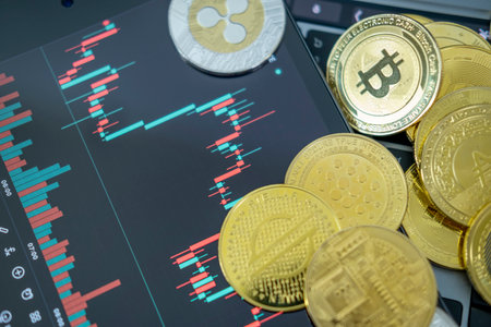 Bitcoin gold coin and on chart background. Virtual cryptocurrency concept. digital crypto currency for defi decentralized financial banking p2p exchange investment via internet online technologyの写真素材