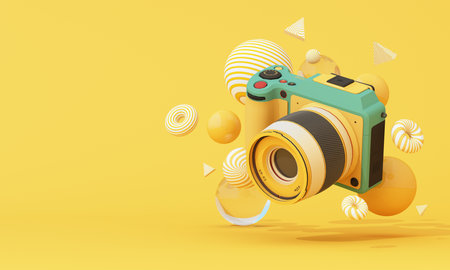 Colorful 3D camera floating in mid-air with playful geometric shapes on a yellow background. Creative minimal composition. 3d rendering.の写真素材