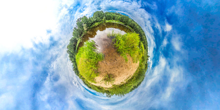 Little planet with river, forest and blue sky.