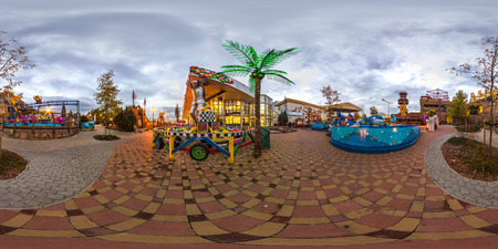 Prague - Autumn, 2018: 3D spherical panorama with 360 degree viewing angle. Ready for virtual reality in vr. Full equirectangular projection. Amusement park with dark sky at night.のeditorial素材