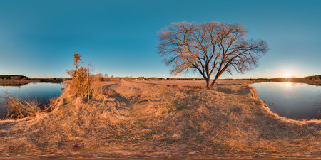 Beautiful landscape with river blue sky sunset at spring trees without greens and grass 3D spherical panorama with 360 degree viewing angle Ready for virtual reality vr Full equirectangular projectionの写真素材