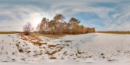Amazing landscape with blue sky at spring trees without grass and greens with snow 3D spherical panorama with 360 degree viewing angle Ready for virtual reality vr Full equirectangular projectionの写真素材