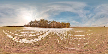 Amazing landscape with blue sky at spring trees without grass and greens with snow 3D spherical panorama with 360 degree viewing angle Ready for virtual reality vr Full equirectangular projectionの写真素材