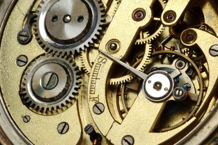 mechanism of old watch. close-up. two gears