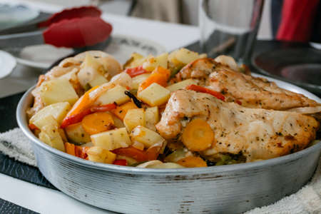 chicken prepared in the oven, with lots of vegetables