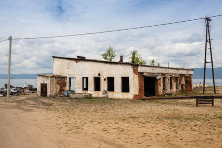 Abandoned brick warehouse. Khuzhir is the main village on Olkhon Island in Lake Baikal in eastern Siberia. The photo was taken in the summer in July.のeditorial素材