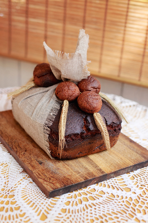 Brown bread wrapped in linenの写真素材