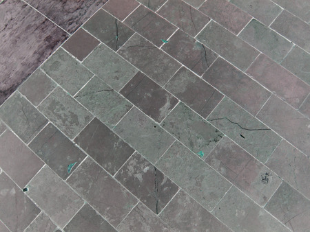 Paving brick walkway. The pattern of stone block pavingの写真素材