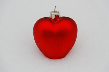 red heart in the snowの写真素材