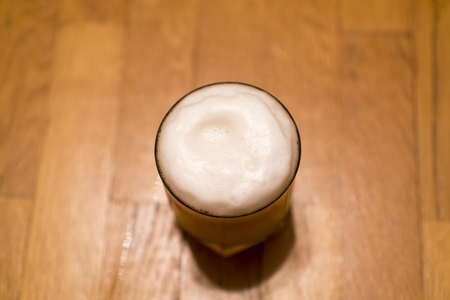 Glass with beer top viewの写真素材