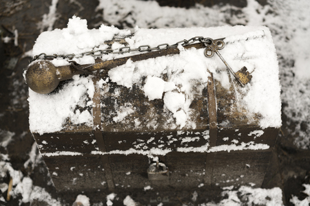 iron chest under the snow. keyの写真素材
