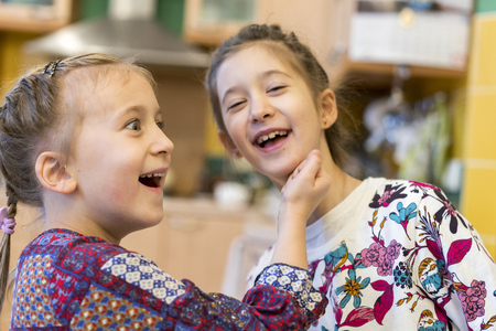 Two young girls arguing or fightingの写真素材