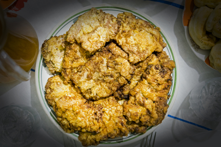Fried meat in a plate. Junk food. Dangerous foodの写真素材