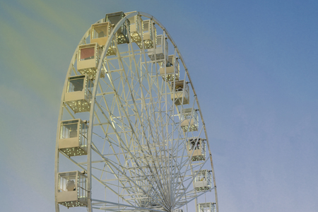 Ferris wheel under the sunlightの写真素材