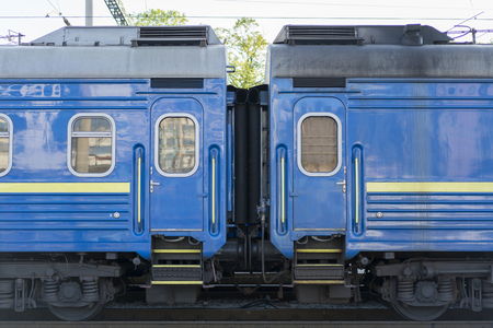 two blue passenger wagons.の写真素材