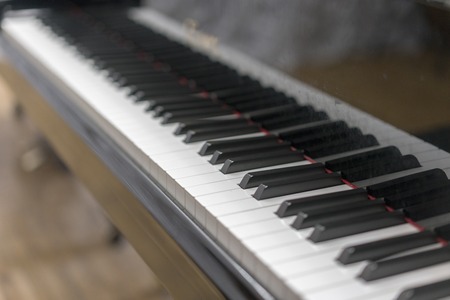Piano keys close-up, selected focus. Close up view of black piano keys , selected focusの写真素材