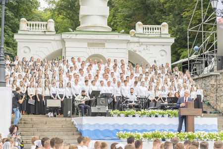 Kiev, Ukraine. July 22 2018 Christian choir of young men and girls in the park sing Christian songs and glorify God.の写真素材