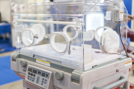 Empty infant incubator in an hospital room. Nursery incubator in hospital.の写真素材