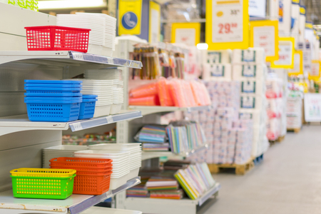 Abstract blur supermarket discount store aisle and product shelves interior defocused background. Supermarket Aisle and Shelves in blurry for background.の写真素材