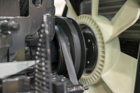 Modern new hi-tech engine of loader or small tractor. Top view. The big new engine on a show window....