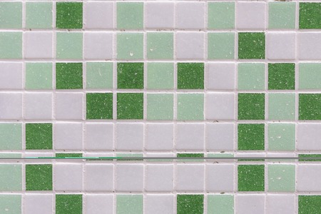 abstract square pixel mosaic wall background and texture. Green glass mosaic tile background patternの写真素材