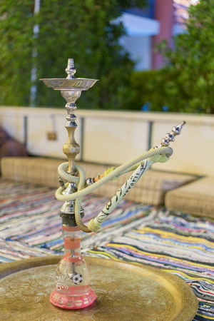 hookah in the restaurant, hookah elements on the background of a blurry interior of the restaurant,...