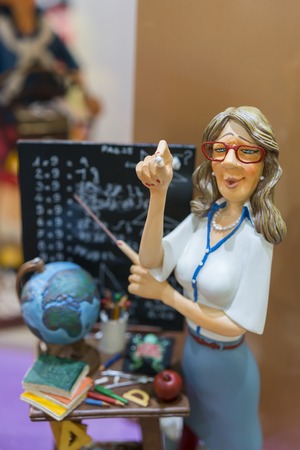 colorful figure of the teacher. The concept of education. vertical photoの写真素材