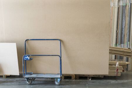 Trolley in a hardware store with building materials. Warehouse large storage.の写真素材