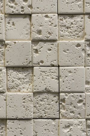 Gray decorative stone background. Gray wall background of concrete block texture. vertical photo.