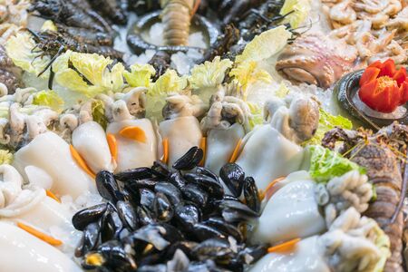 Fresh sea fish in ice at the market. healthy seafood.
