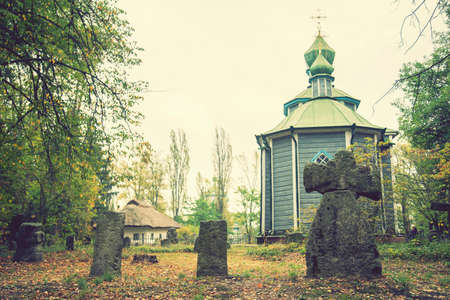Old cemetery near the church. tonedの写真素材