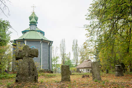 Old cemetery near the church. tonedの写真素材