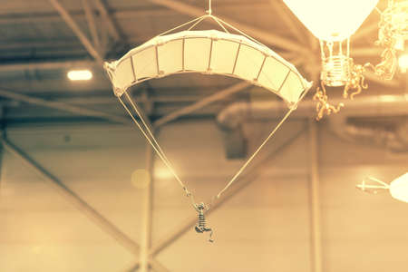 Creative chandelier for childrens room. Lamp in the form of a parachute for a childrens room. toned.の写真素材