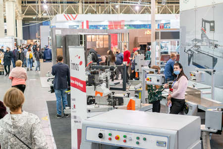 Kiev, Ukraine March 5 2021. Furniture exhibition during a pandemic. international furnishing accessories exhibition. Equipment for the production of furniture. Exhibition and social distanceのeditorial素材
