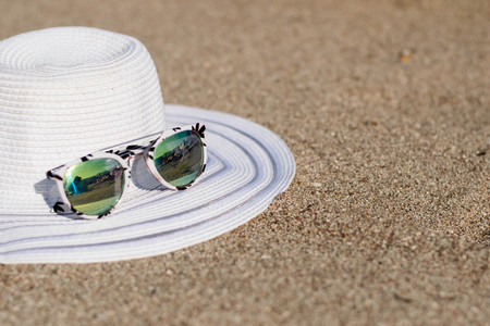 sandy beach with summer accessories