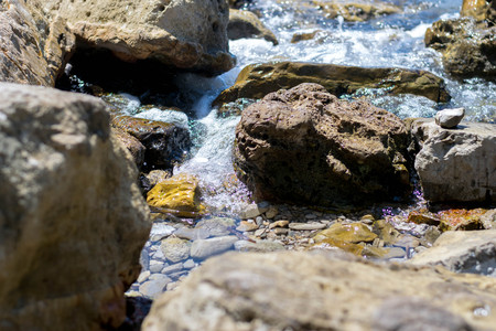 Sea coast with stones at the early morningの写真素材