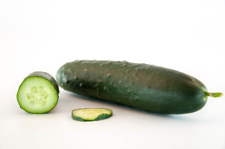 Cucumber slices on a white backgroundの写真素材