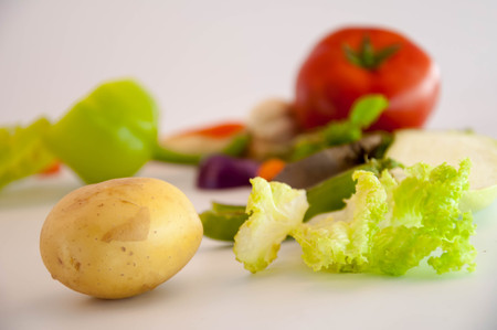 Kitchen - fresh colorful organic vegetables on worktopの写真素材