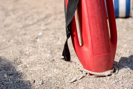 Red plastic buoy for a lifeguardの写真素材