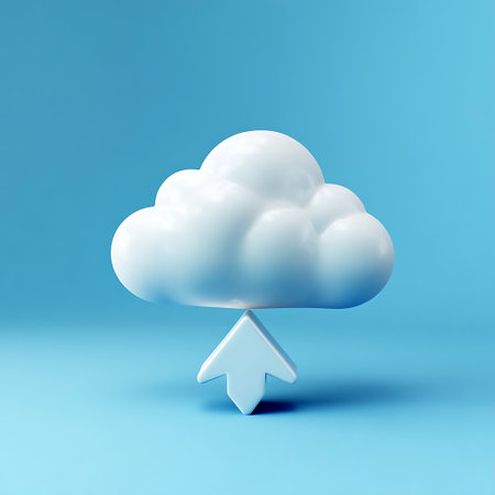 Cloud Upload: A white stylized cloud hovers above an upward-pointing arrow all on a bright blue background.の写真素材