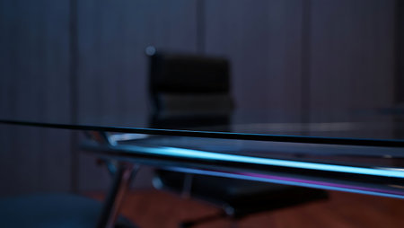 Table and chair in a modern office, close-up, blurred backgroundの写真素材